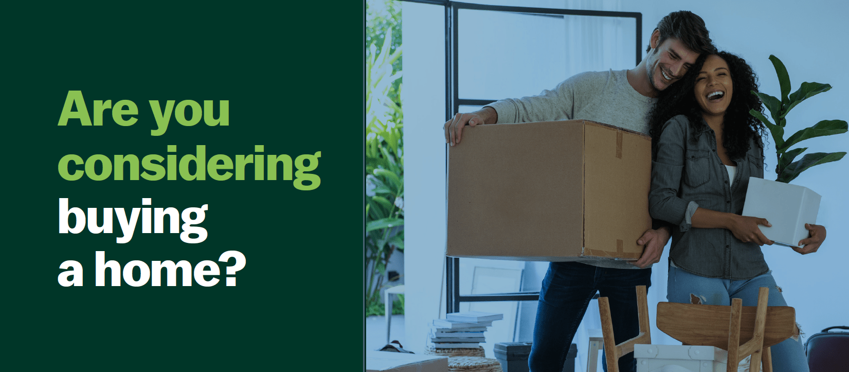 young couple unpacking items in their new home