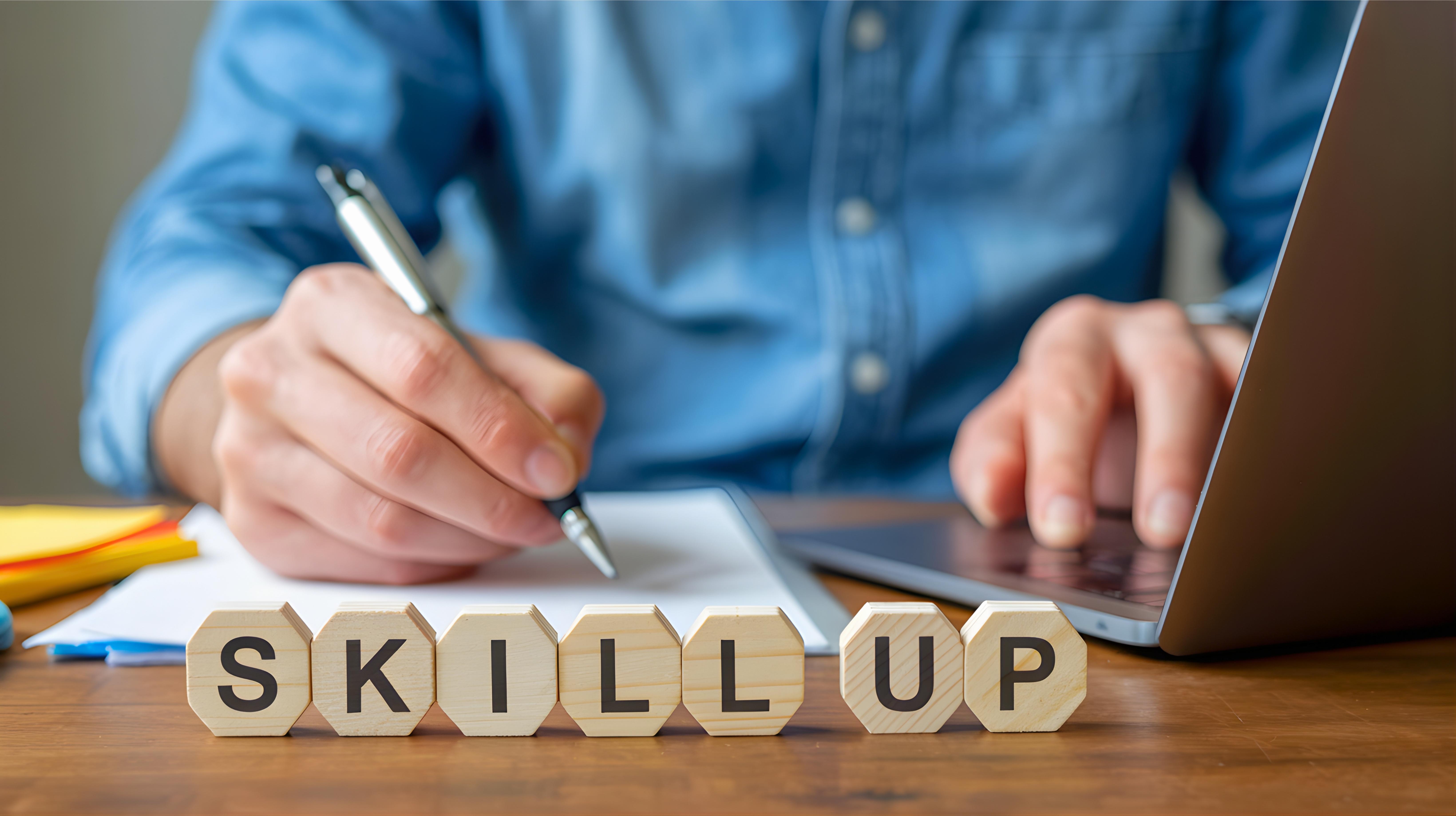 letter blocks on desk spells "skill up"